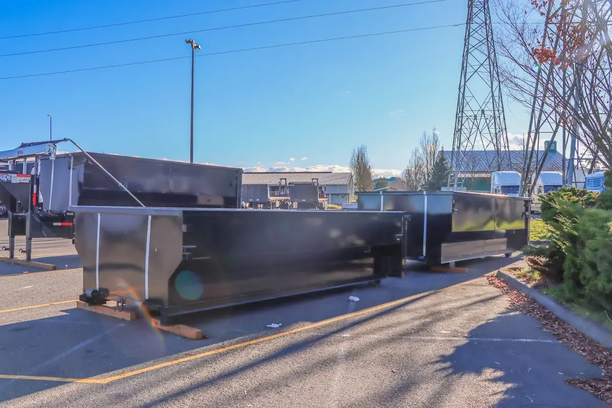 Roll-off dumpster ready for waste disposal at job site for Demolition Dumpster Rental in Columbus